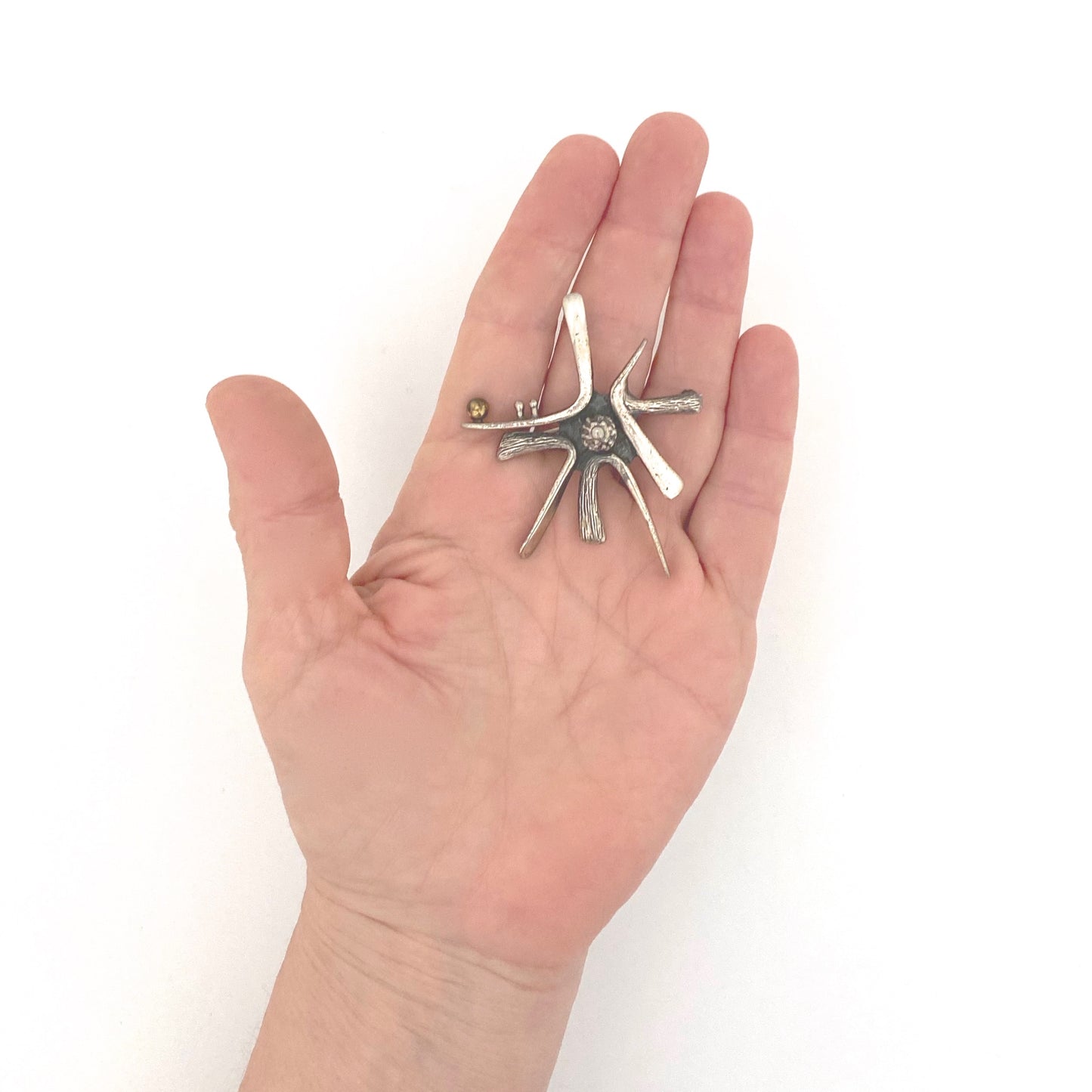 scale Guy Vidal Canada vintage brutalist pewter bronze sphere starburst brooch Canadian Modernist jewelry design
