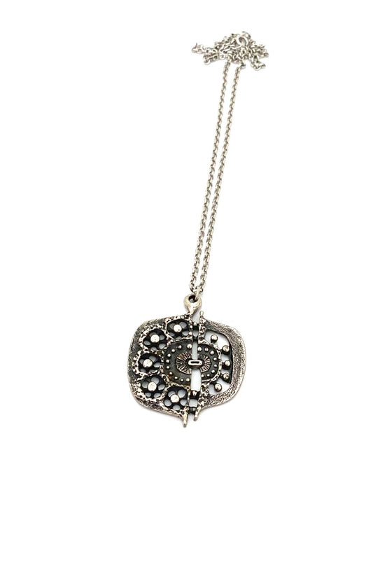 Guy Vidal Canada vintage brutalist pierced pewter pendant necklace Canadian jewelry design