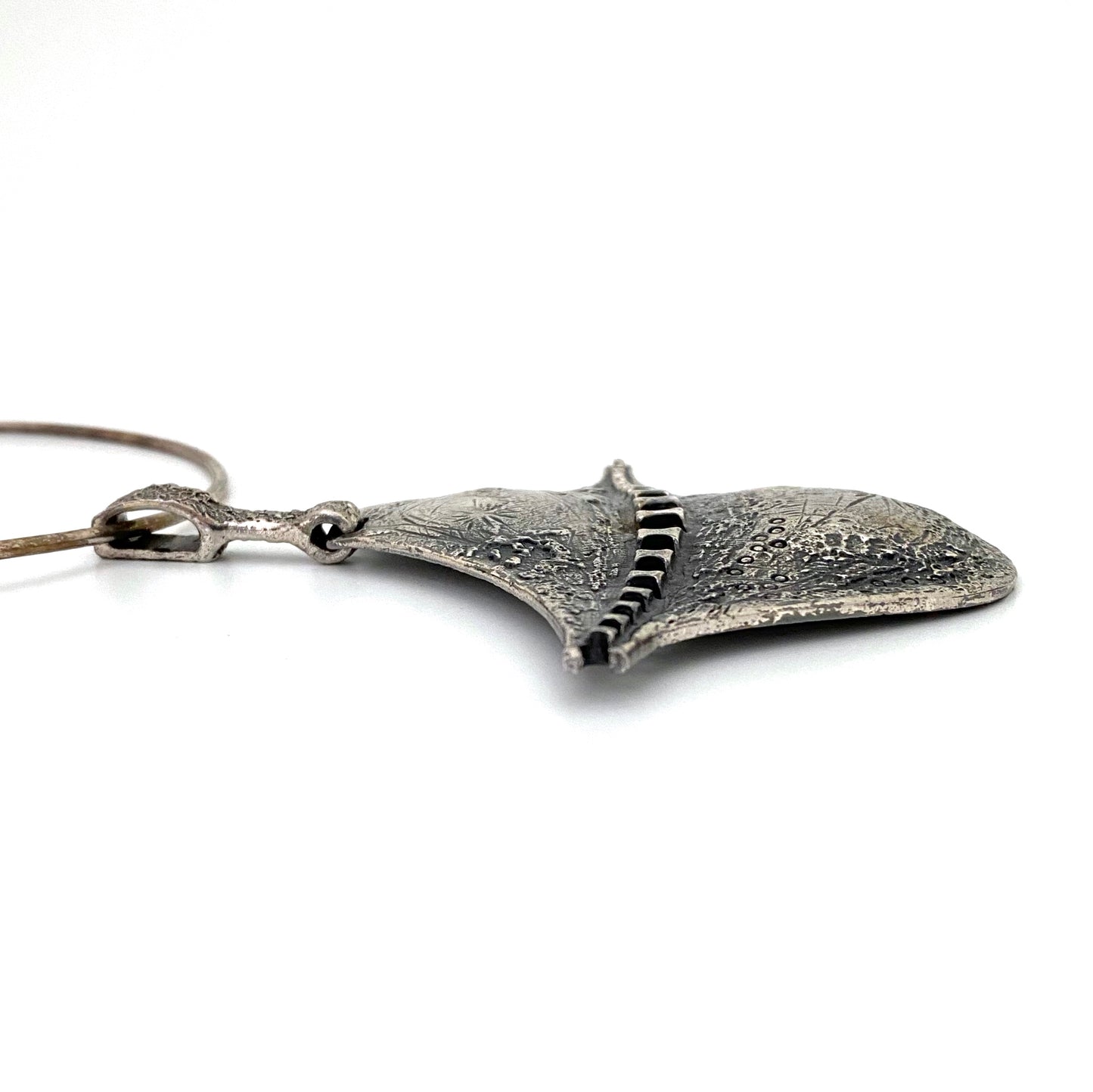 profile Guy Vidal Canada vintage extra large brutalist pewter pierced pendant Canadian jewelry design