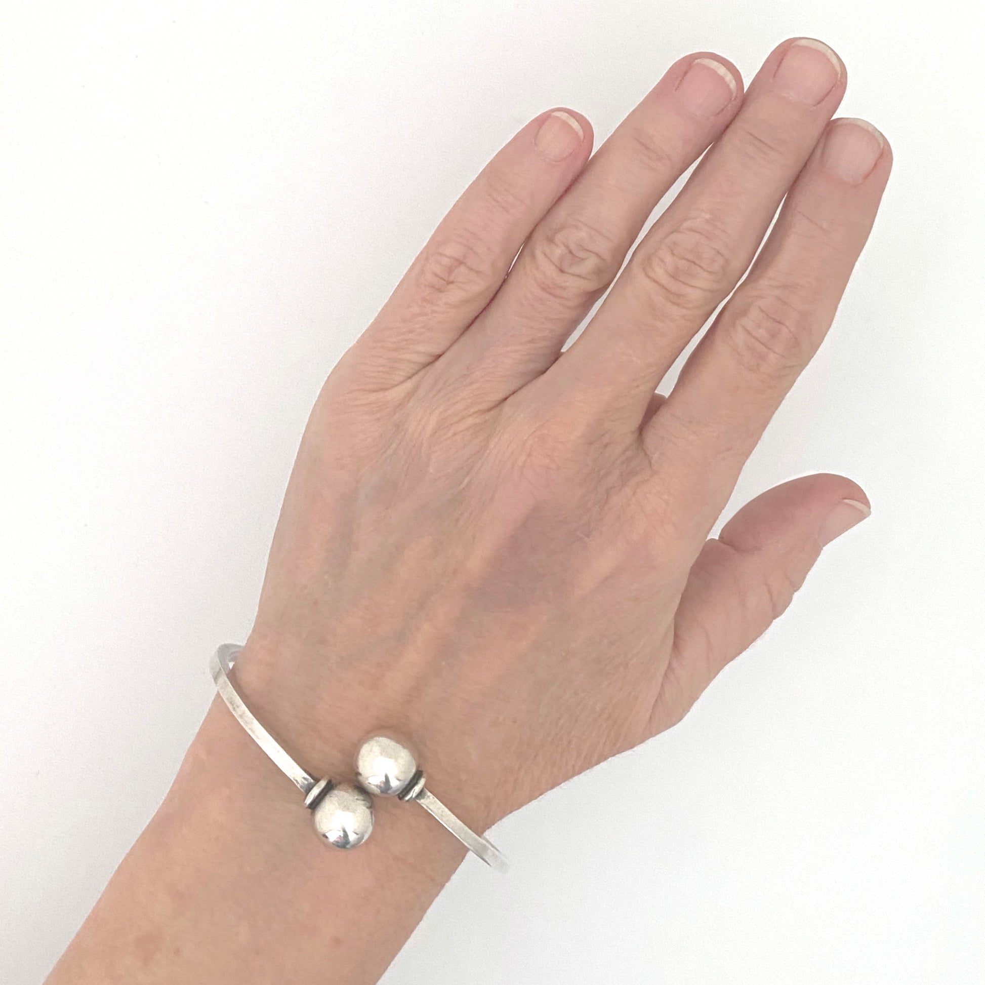 scale Hans Hansen Denmark vintage silver spheres bangle bracelet Scandinavian Modernist jewelry design