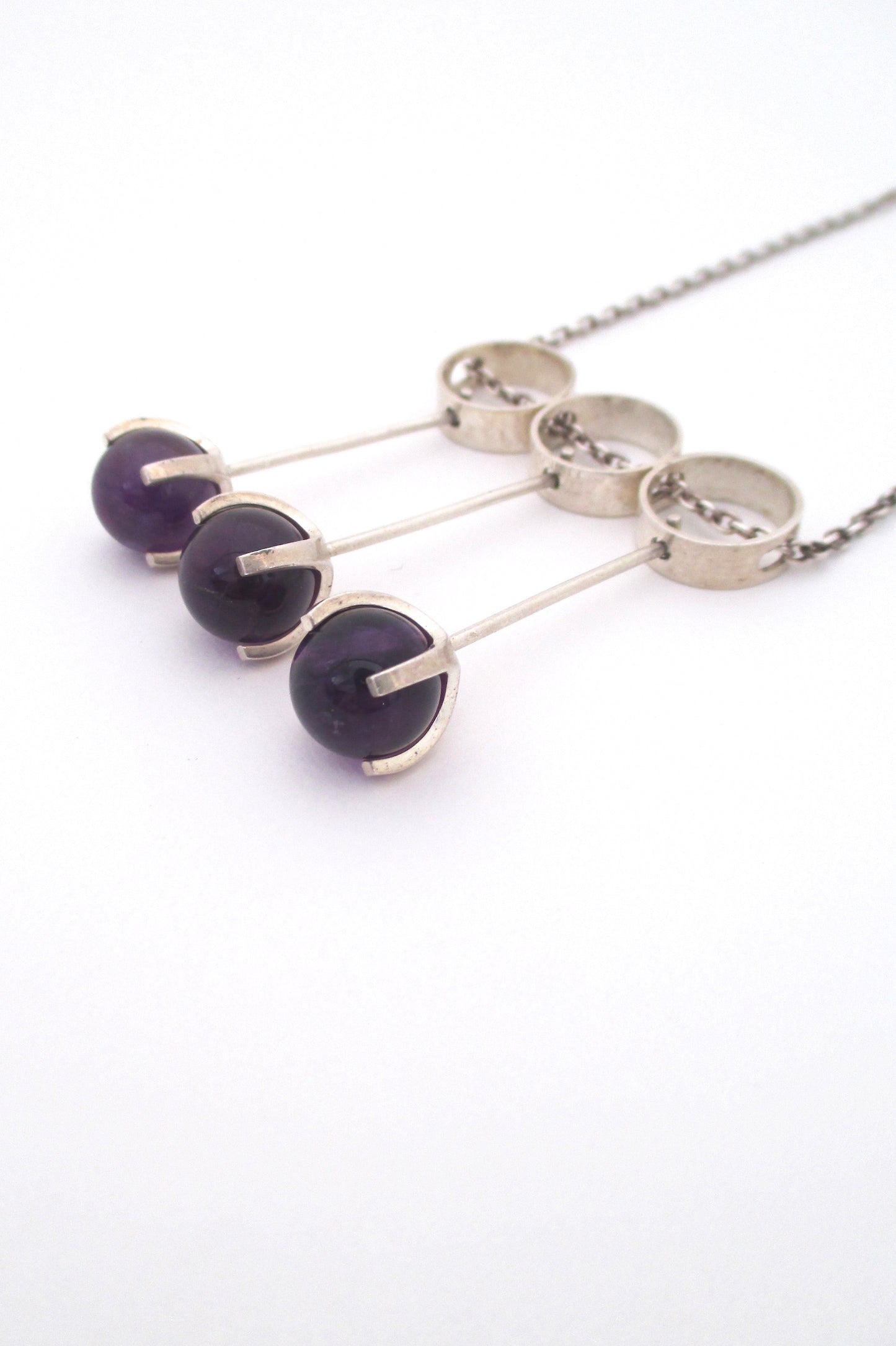 Elis Kauppi kinetic triple amethyst pendant