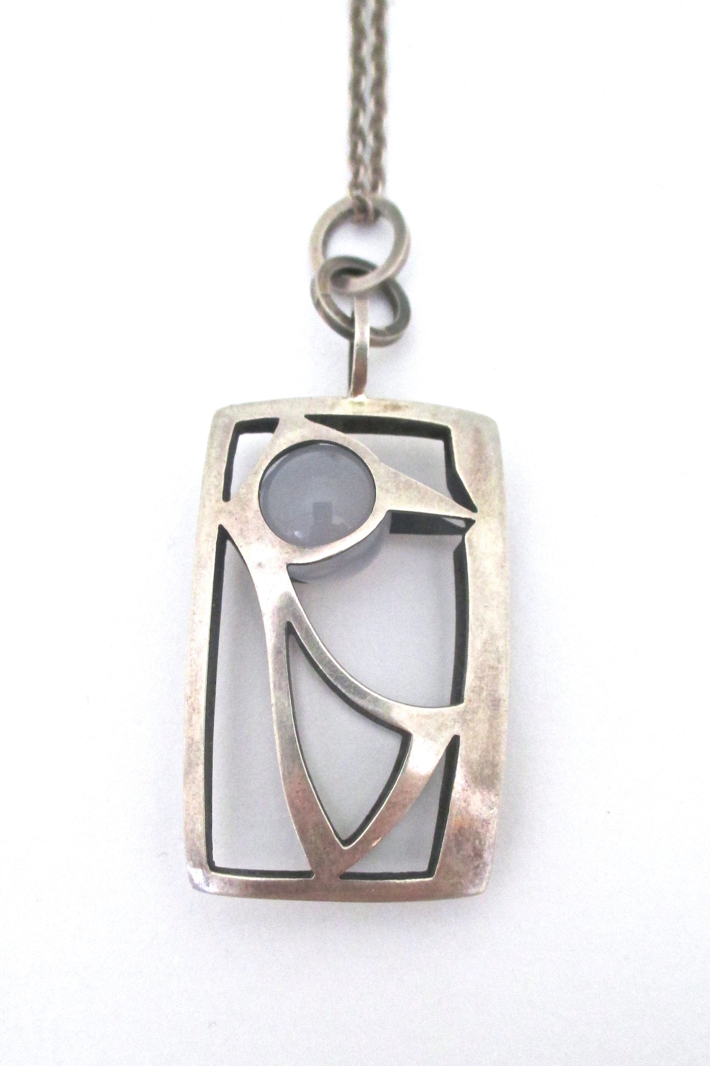 Elis Kauppi caged sphere bird pendant necklace