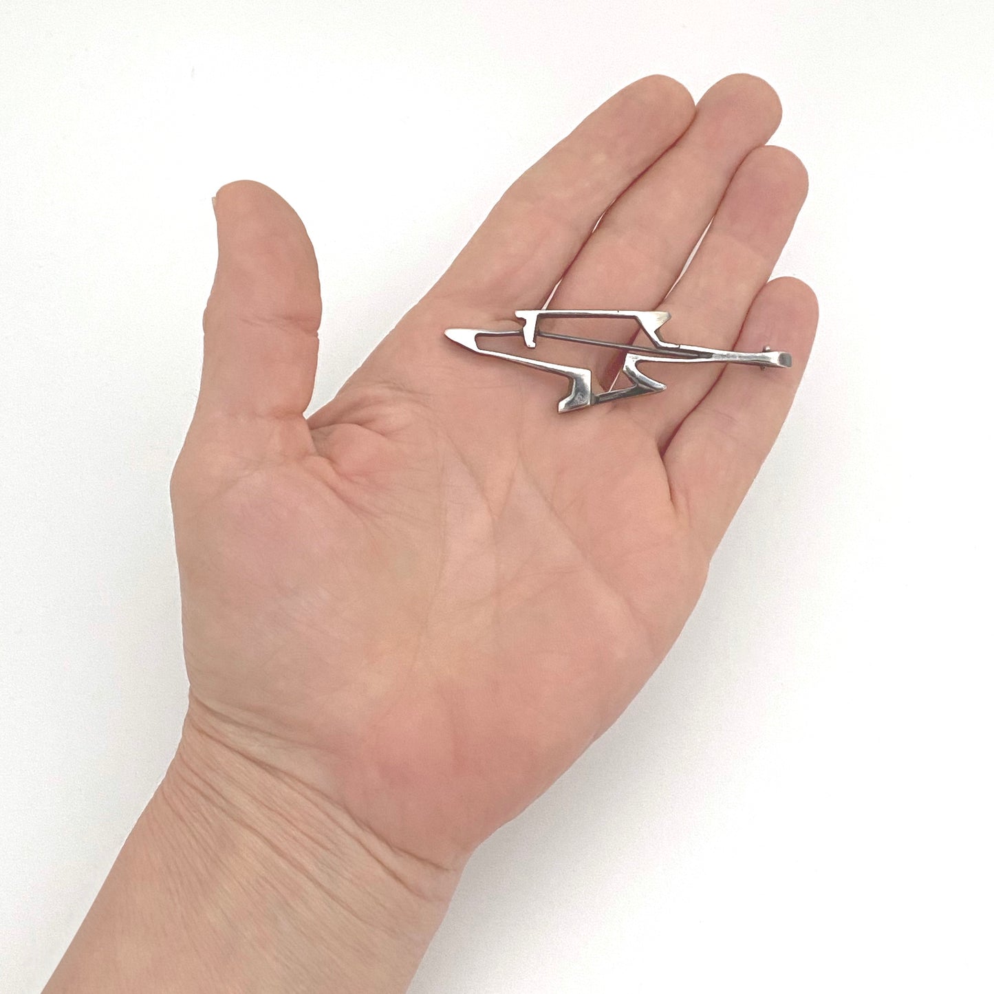 scale Tostrup Norway vintage silver openwork brooch pendant Gudmund Elvestad Scandinavian Modernist jewelry design