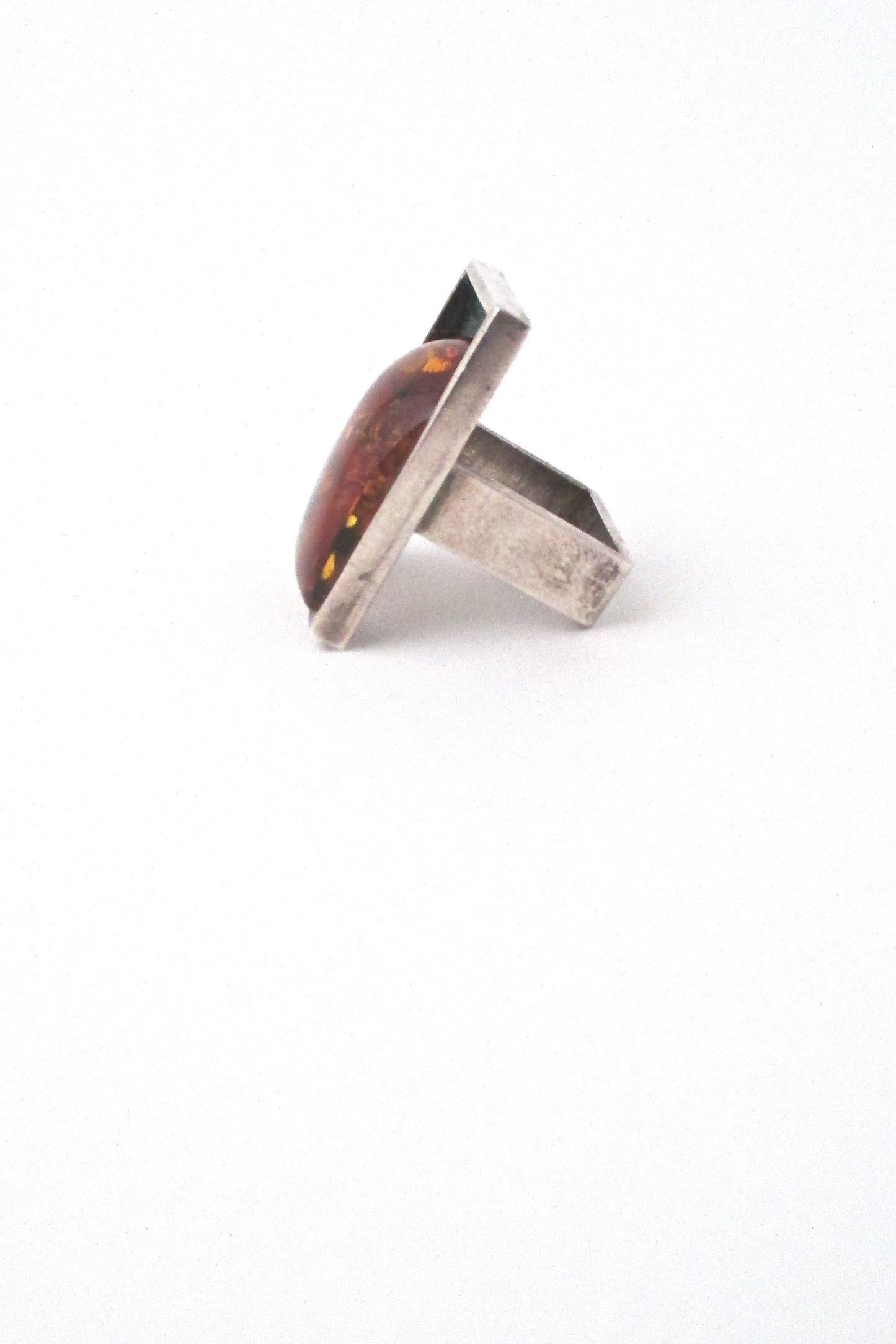 profile Mariusz Gliwinski Poland extra large silver amber ring Modernist design