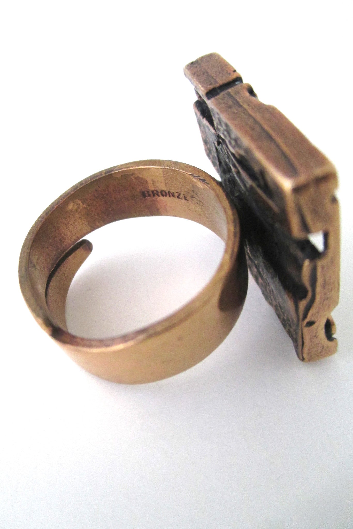 Jorma Laine polished bronze pierced square ring