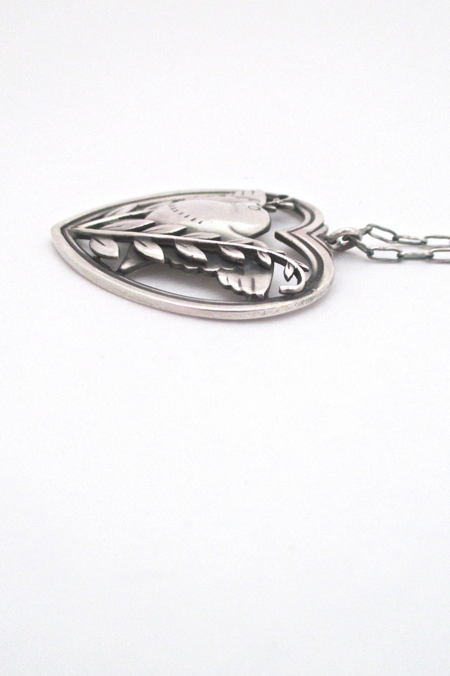 profile Georg Jensen Denmark vintage silver bird heart pendant necklace 97 by Arno Malinowski