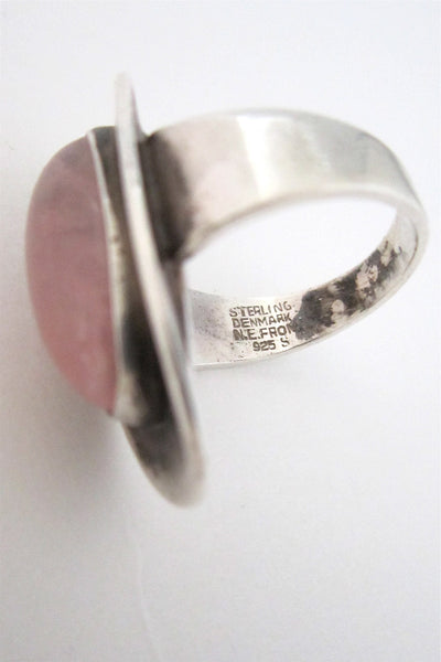 N E From rose quartz ring
