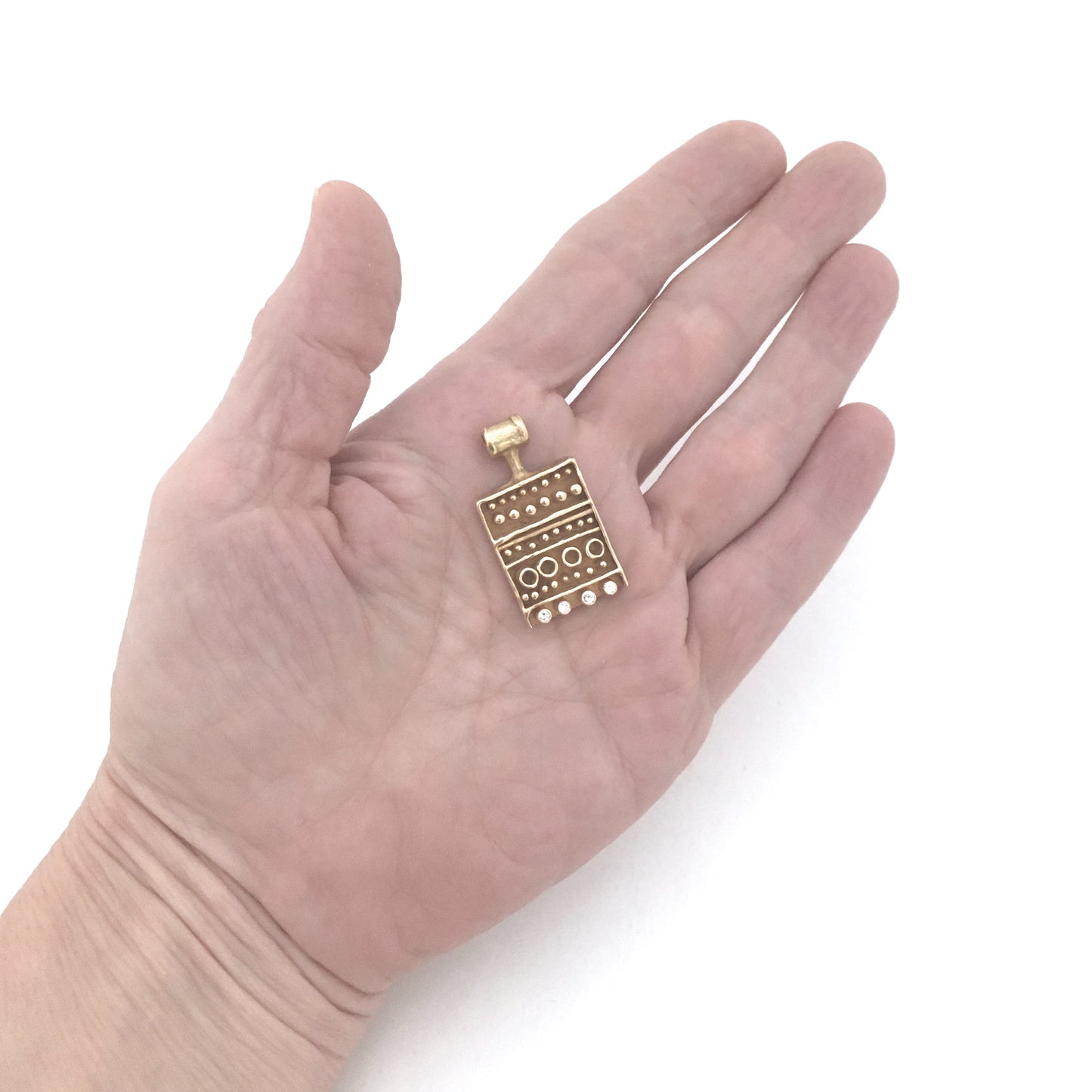 Walter Schluep 18k gold and diamond pendant