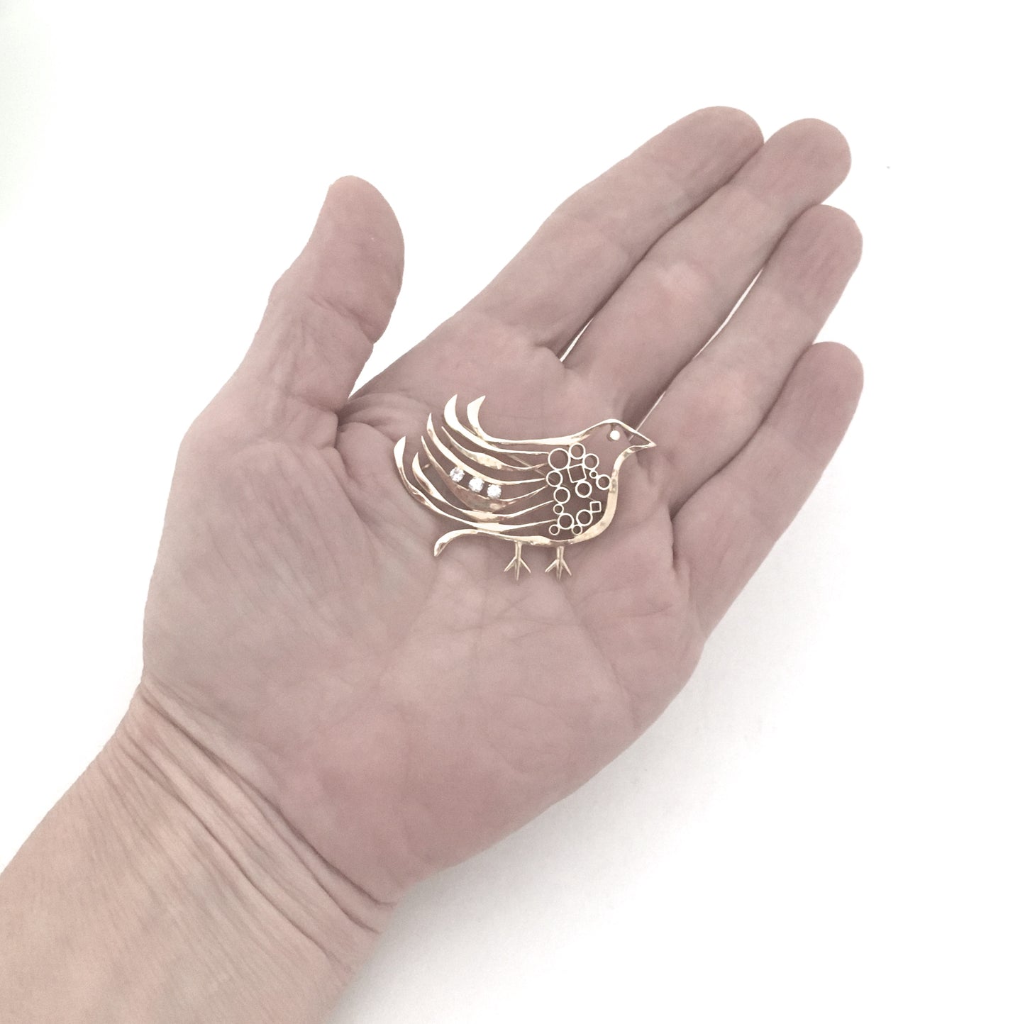 Walter Schluep 18k & diamond bird brooch