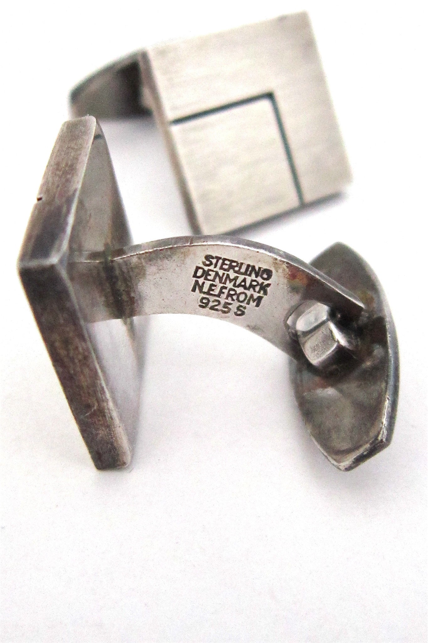 N E From squares cuff links