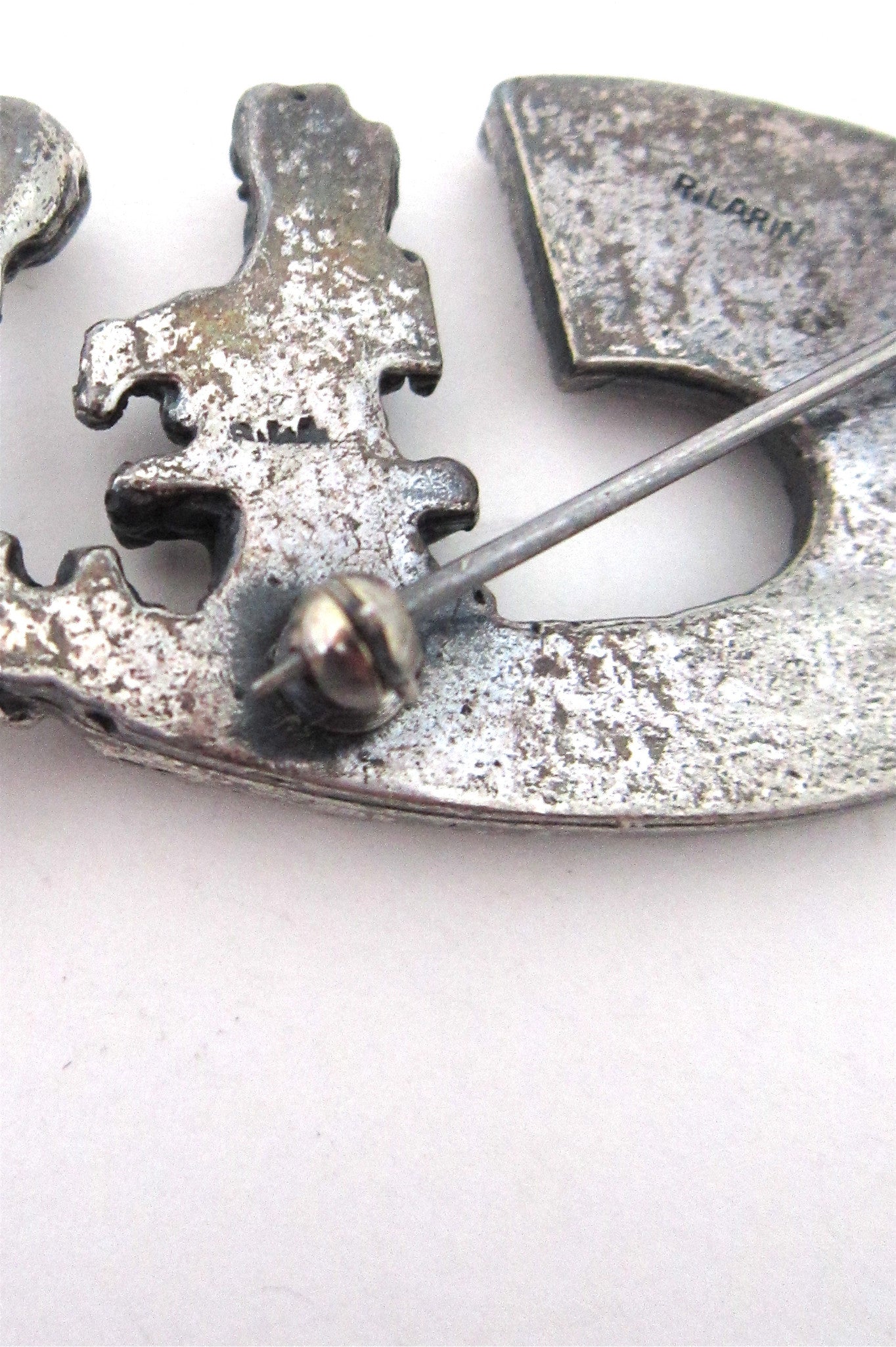 Robert Larin bronze sphere brooch