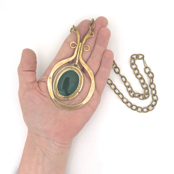 scale Rafael Alfandary Canada vintage brass classic kinetic pendant necklace clear dark green glass stone