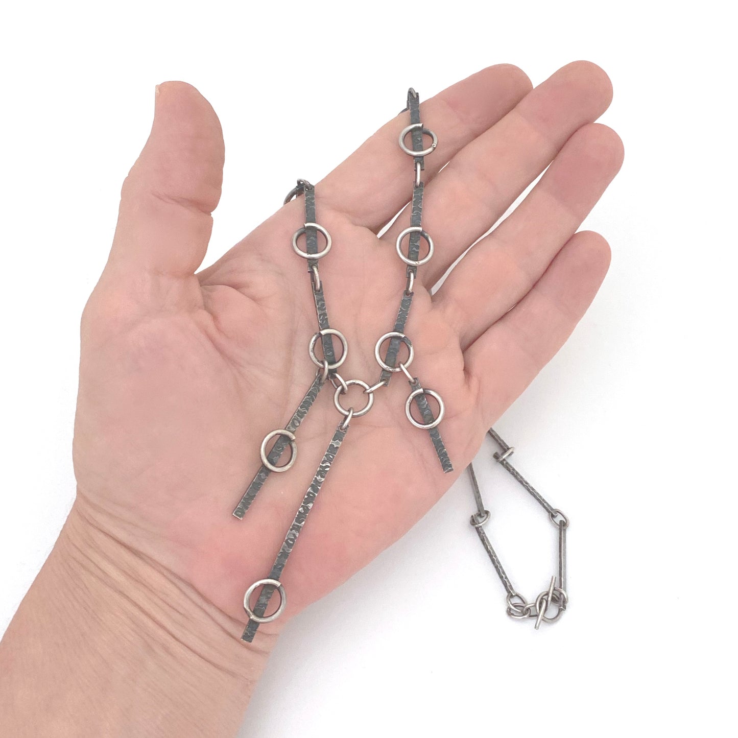 scale vintage hand wrought brutalist silver kinetic necklace Spain Modernist jewelry design