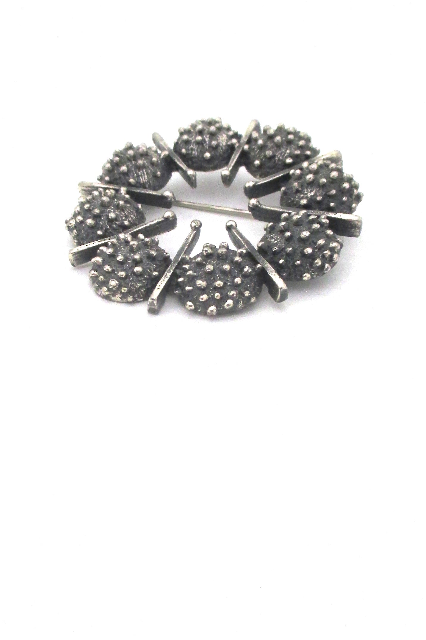 Guy Vidal openwork round pewter brooch