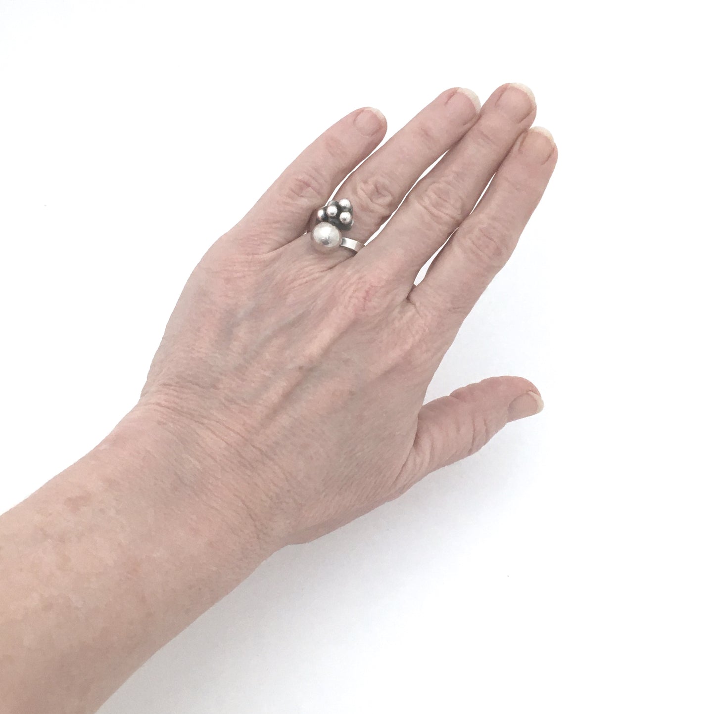 Elis Kauppi 'silver spheres' wrap ring