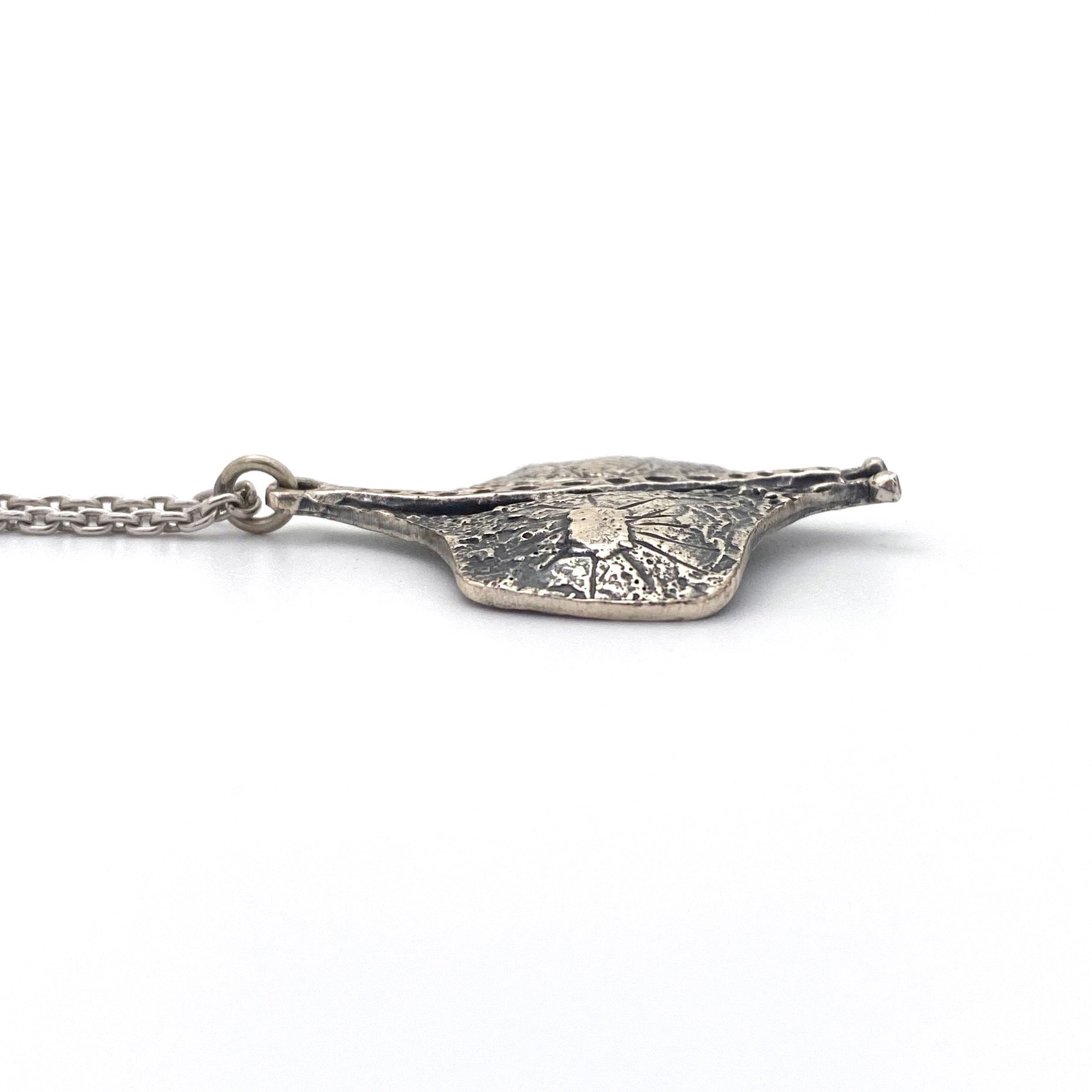 profile Guy Vidal Canada vintage brutalist pewter stingray pendant necklace Canadian Modernist jewelry design