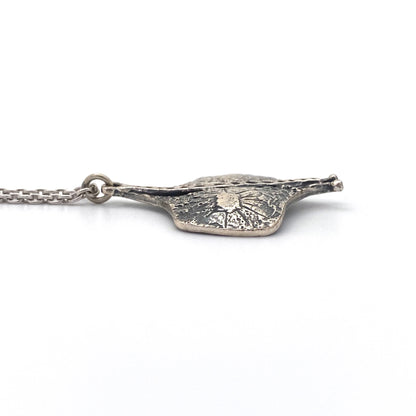 profile Guy Vidal Canada vintage brutalist pewter stingray pendant necklace Canadian Modernist jewelry design