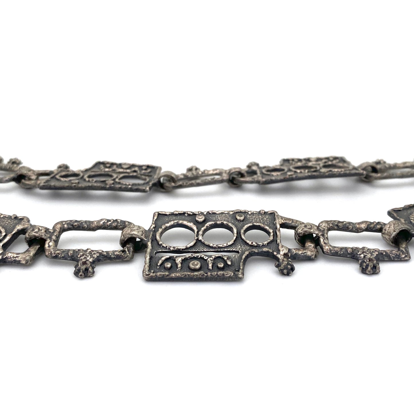 profile Guy Vidal Canada vintage brutalist pewter belt necklace Canadian Modernist jewelry design