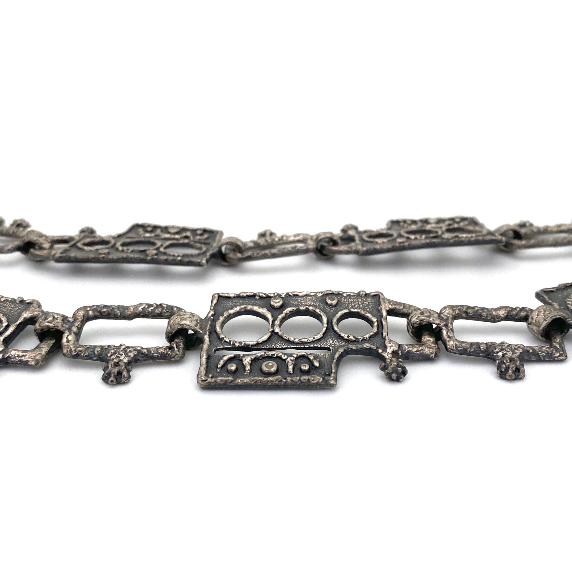 profile Guy Vidal Canada vintage brutalist pewter belt necklace Canadian Modernist jewelry design