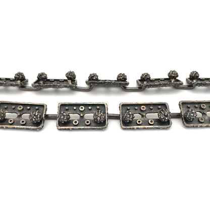 profile Guy Vidal Canada vintage brutalist pewter belt necklace Canadian Modernist jewelry design