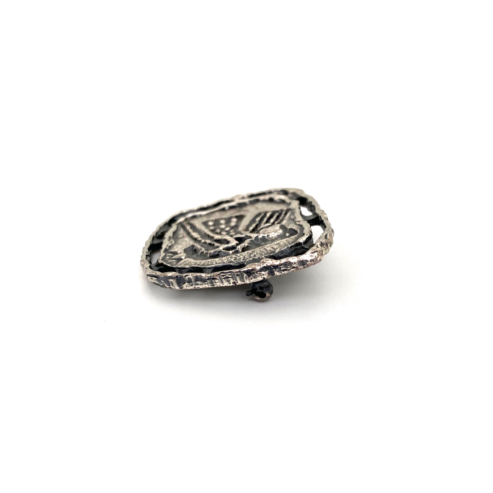 profile Guy Vidal Canada vintage brutalist pewter bird brooch Canadian Modernist jewelry design