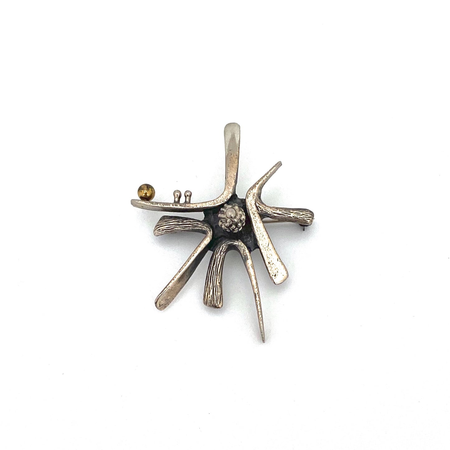 Guy Vidal 'starburst' brooch ~ bronze sphere