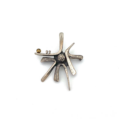Guy Vidal 'starburst' brooch ~ bronze sphere