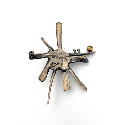 Guy Vidal 'starburst' brooch ~ bronze sphere