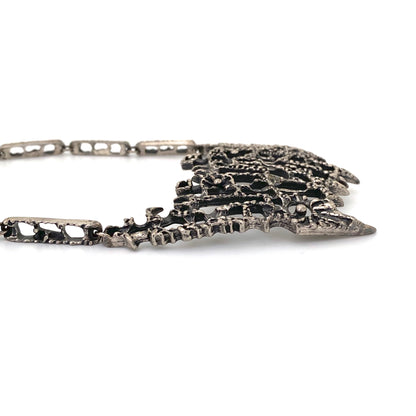 profile Guy Vidal Canada vintage brutalist pewter large bib necklace Canadian Modernist jewelry design