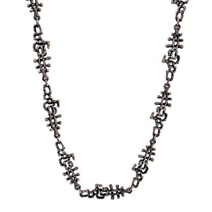 detail Guy Vidal Canada vintage brutalist pewter openwork long link chain necklace Canadian jewelry design