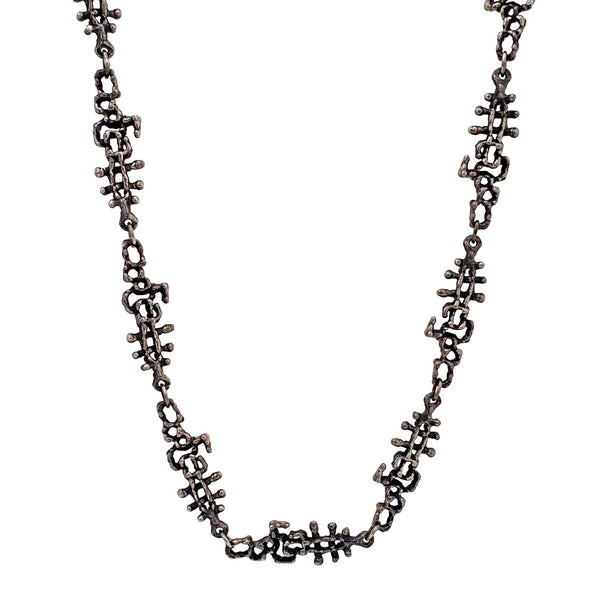 detail Guy Vidal Canada vintage brutalist pewter openwork long link chain necklace Canadian jewelry design