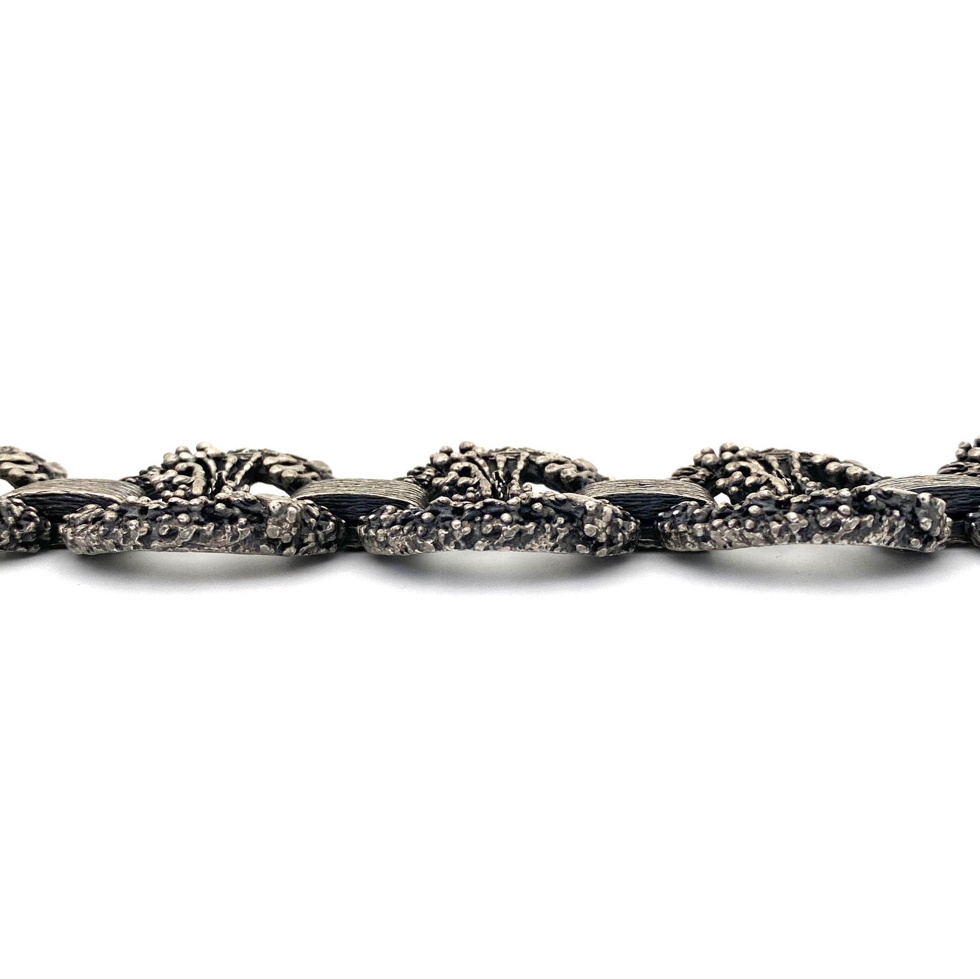 profile Guy Vidal Canada vintage brutalist pewter openwork panel link bracelet Canadian Modernist jewelry design