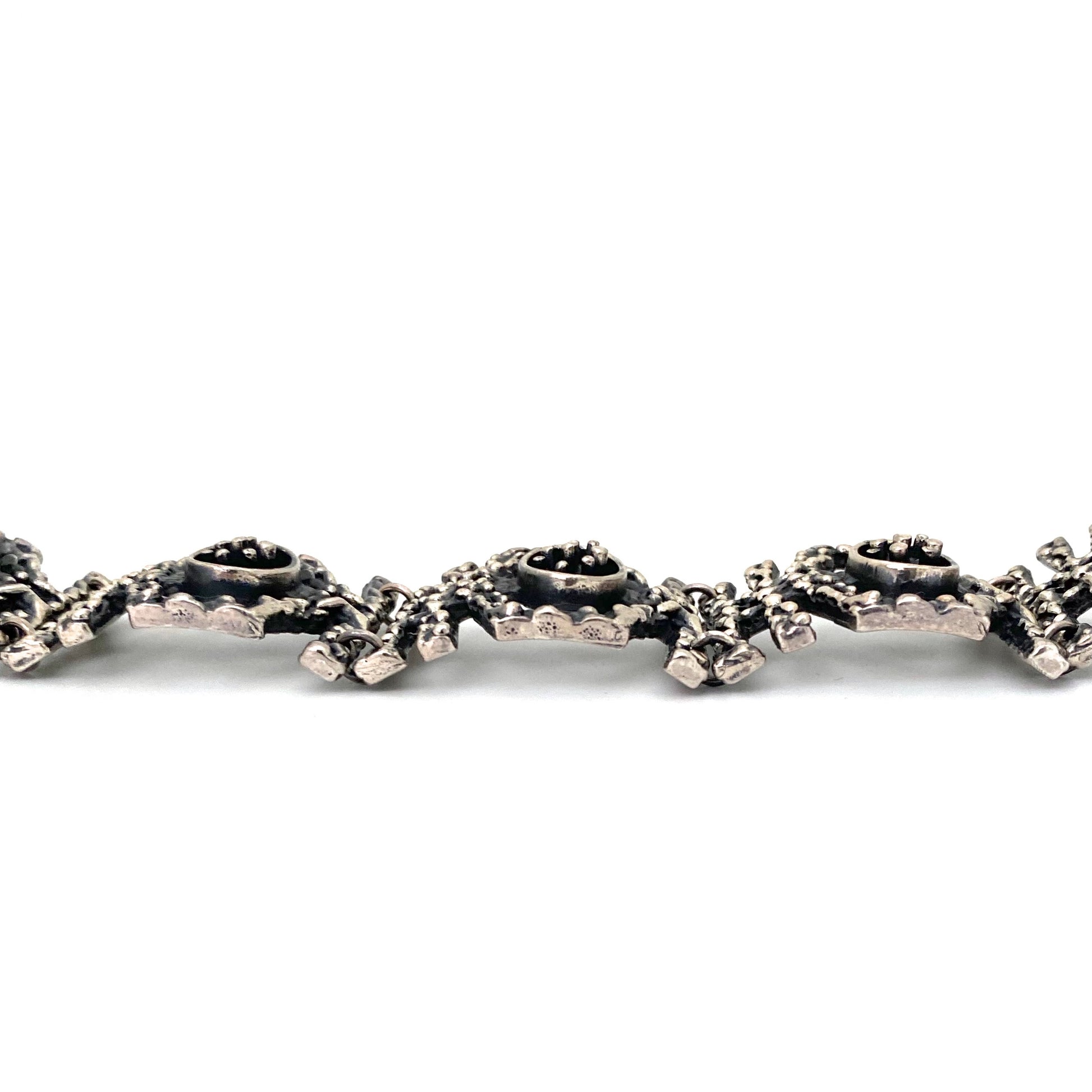 profile Guy Vidal Canada vintage brutalist pewter openwork panel link bracelet Canadian Modernist jewelry design