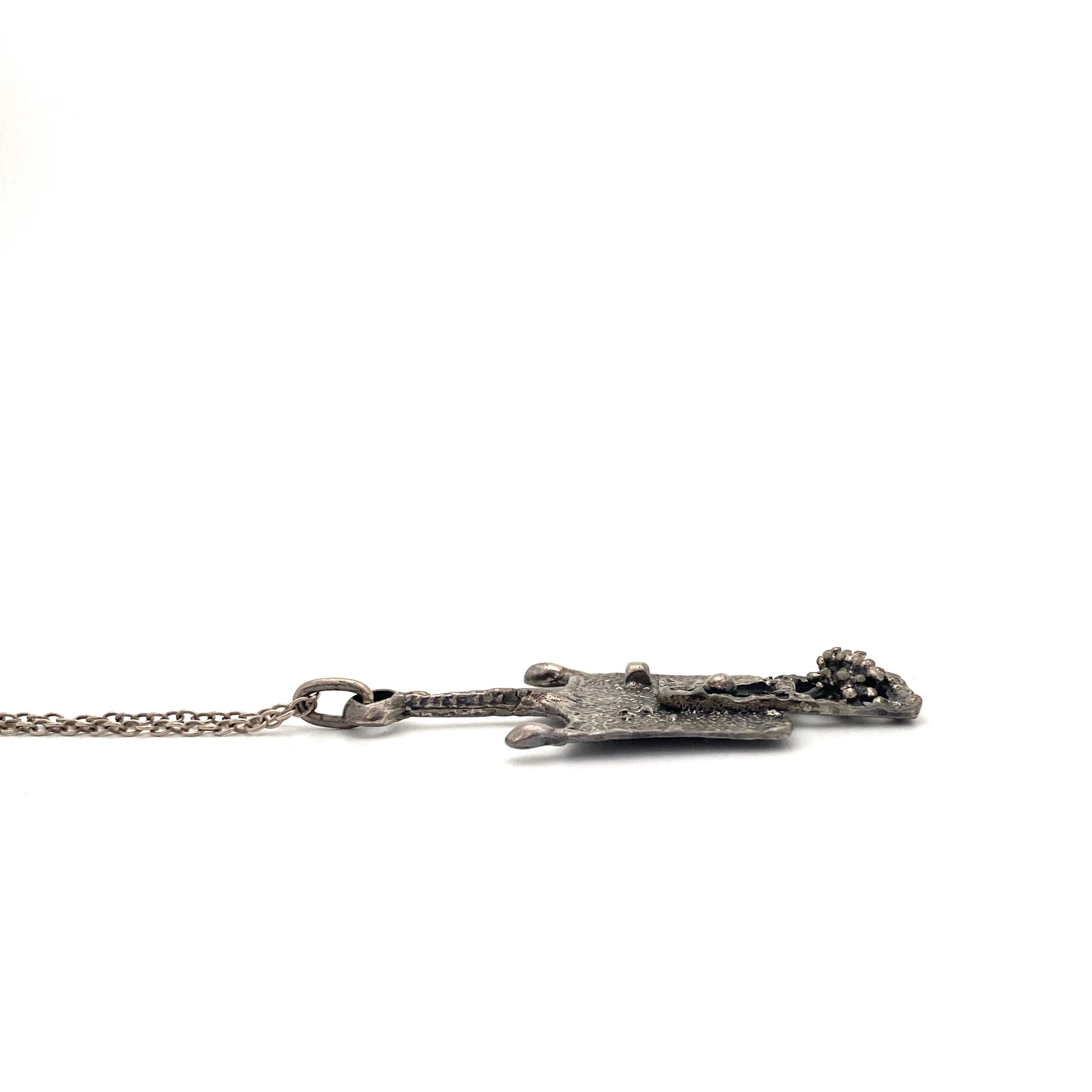 profile Guy Vidal Canada vintage brutalist pewter pendant necklace Canadian Modernist jewelry design