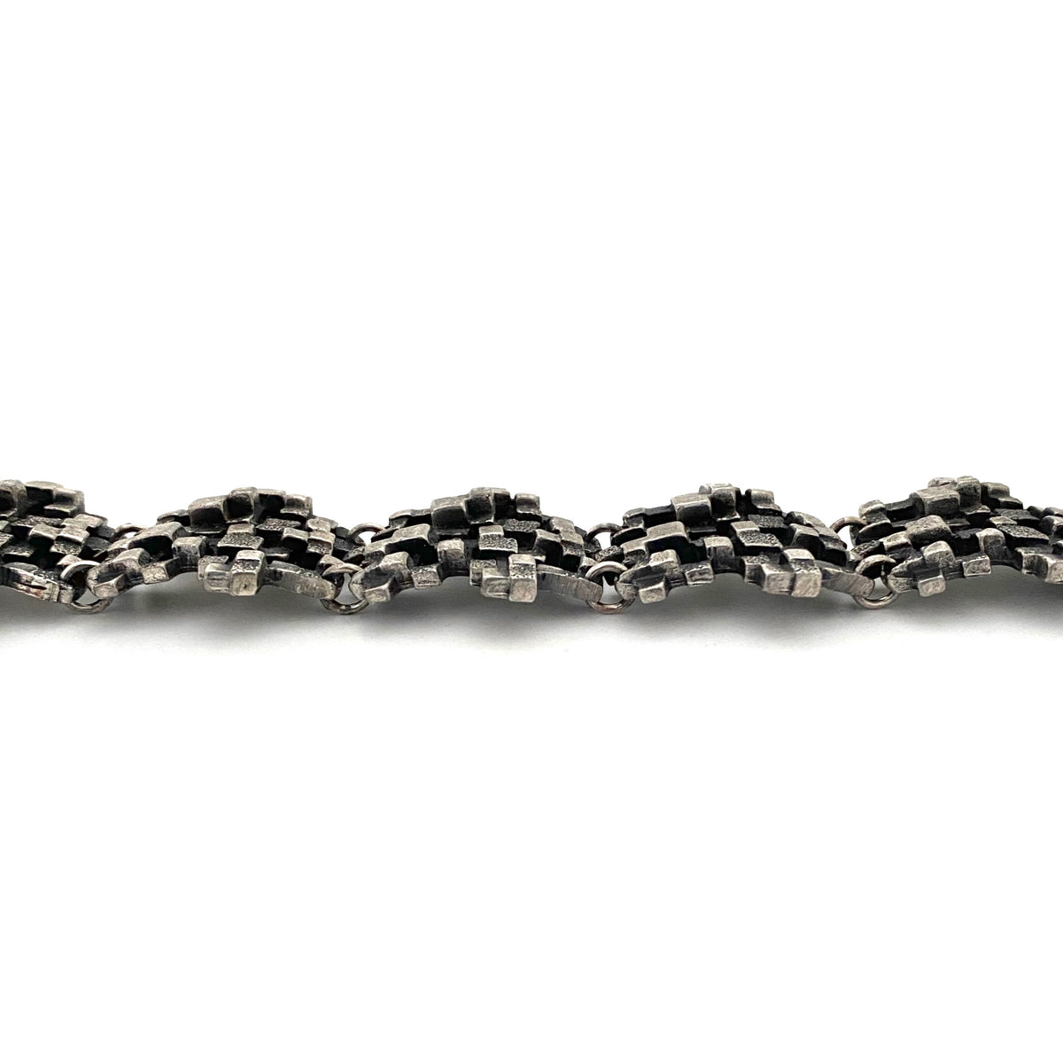 profile Guy Vidal Canada vintage brutalist pewter stacked cubes link bracelet Canadian Modernist jewelry design