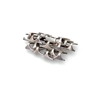 Rey Urban silver openwork dimensional brooch