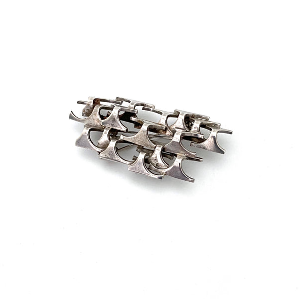 Rey Urban silver openwork dimensional brooch