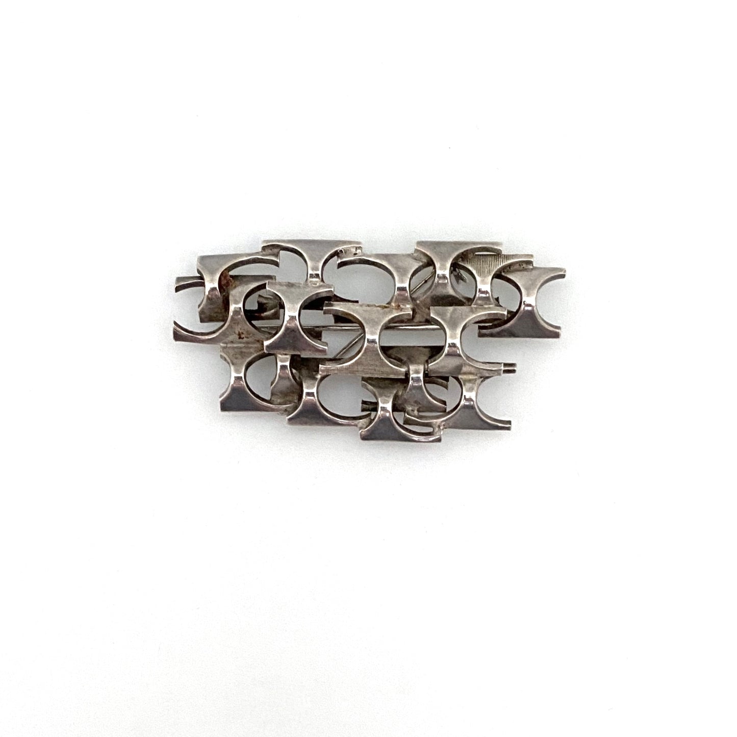 Rey Urban silver openwork dimensional brooch