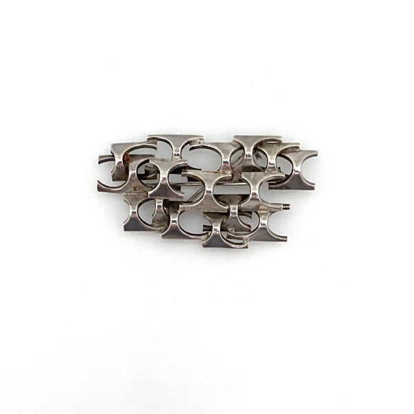 Rey Urban silver openwork dimensional brooch