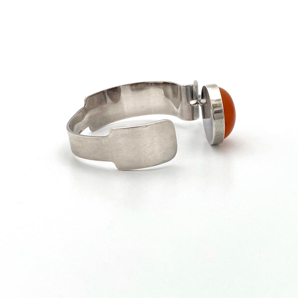 profile Gilbert Rheme Canada vintage sterling silver orange agate cuff bracelet Canadian Modernist jewelry design