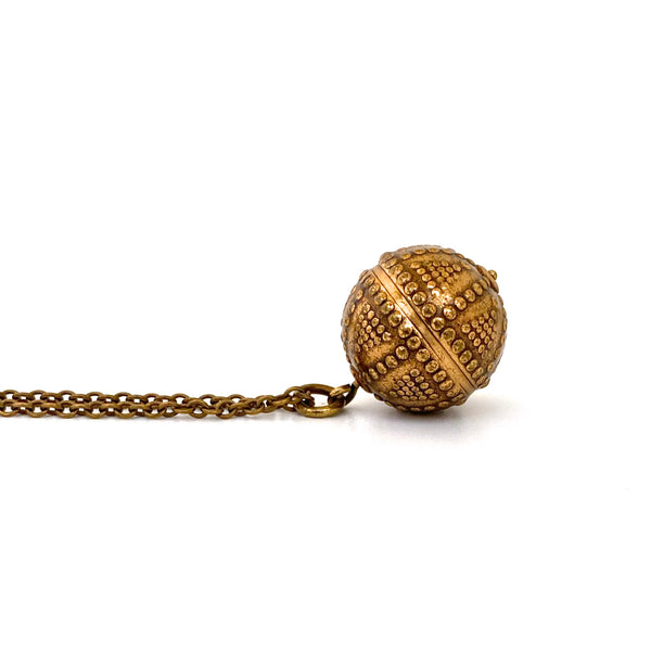 profile Kalevala Koru Finland vintage bronze sphere pendant necklace Scandinavian jewelry design