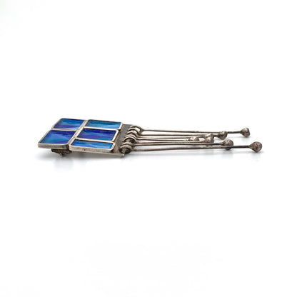 profile Norman Grant Scotland vintage silver enamel Mexican Blanket kinetic brooch pendant necklace Modernist jewelry design