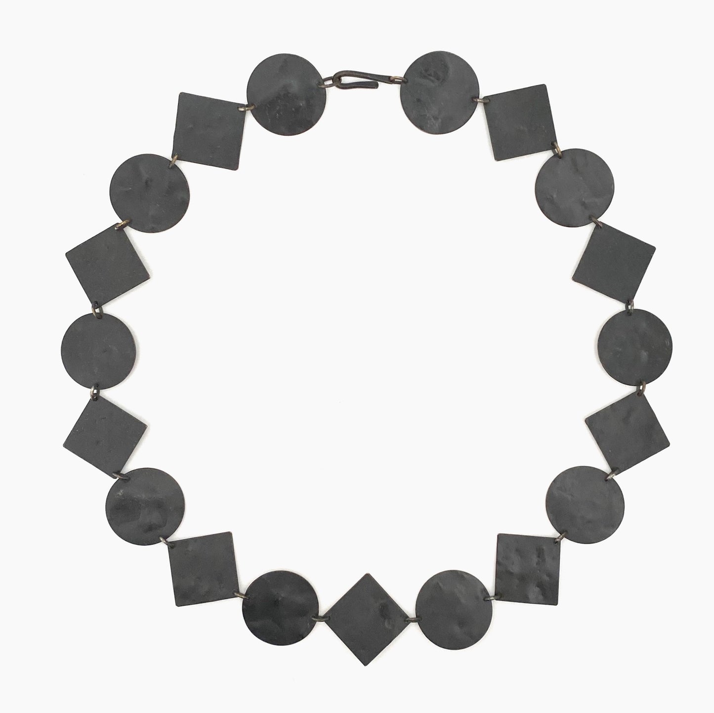 Martha Sturdy long circles and squares textured metal necklace