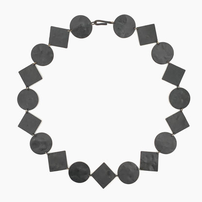 Martha Sturdy long circles and squares textured metal necklace