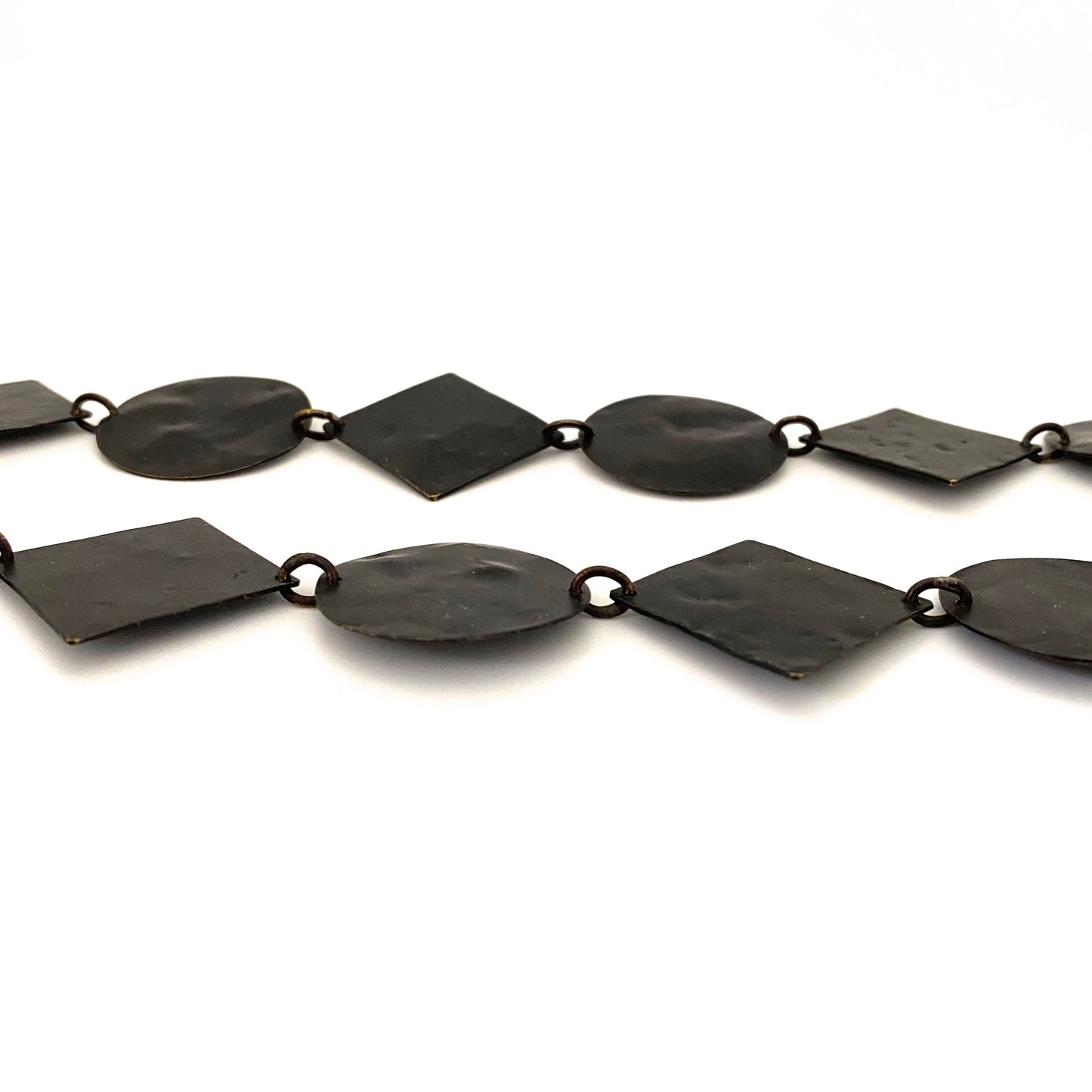 profile Martha Sturdy Canada vintage textured metal circles and squares necklace Canadian postmodern jewelry design