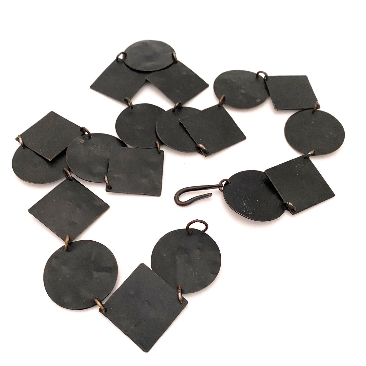 Martha Sturdy long circles and squares textured metal necklace