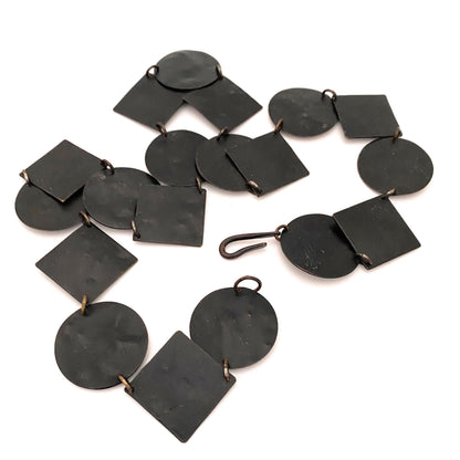 Martha Sturdy long circles and squares textured metal necklace