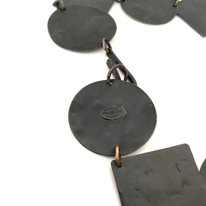 Martha Sturdy long circles and squares textured metal necklace