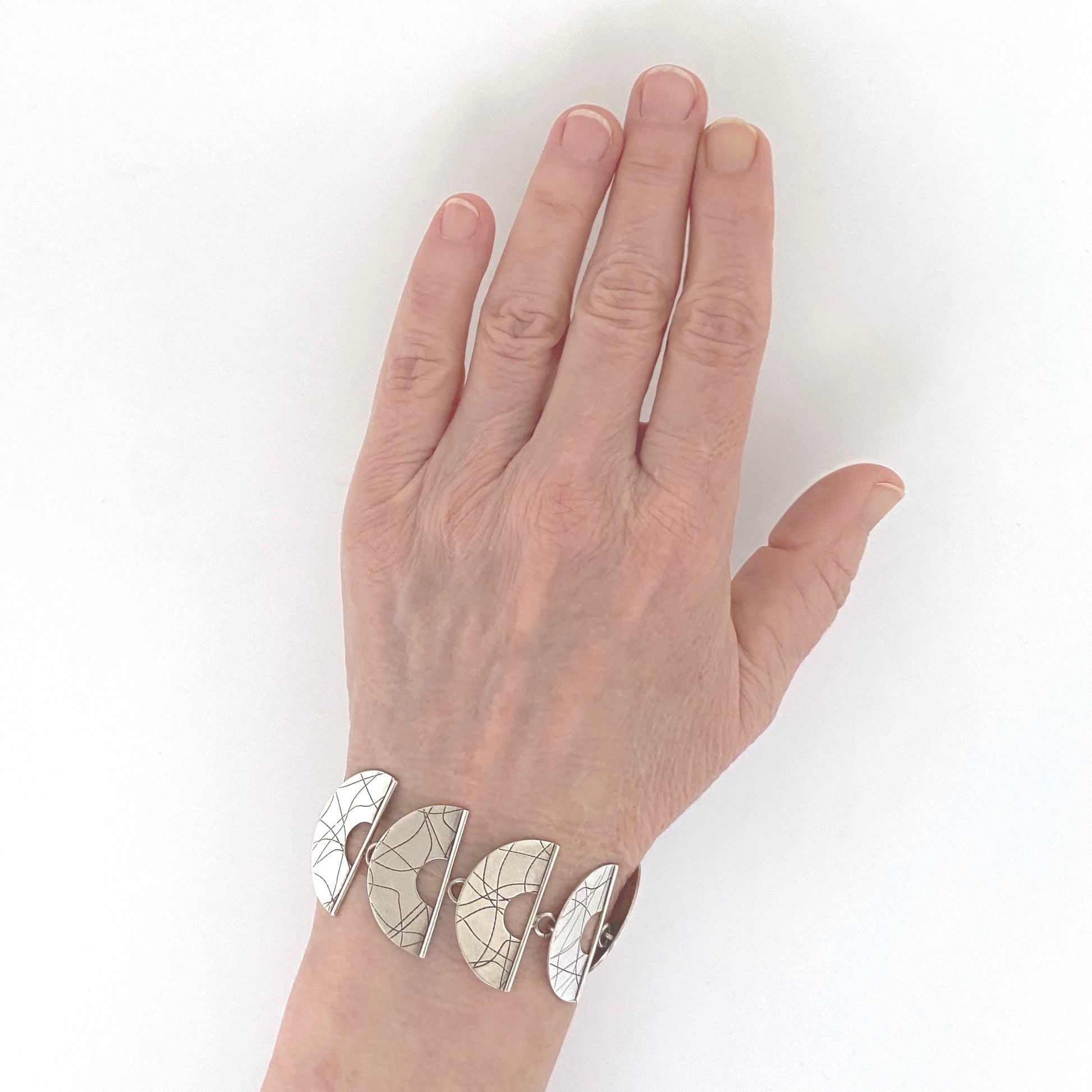 scale Mike and Paula Letki Canada vintage silver postmodern link bracelet Canadian jewelry design