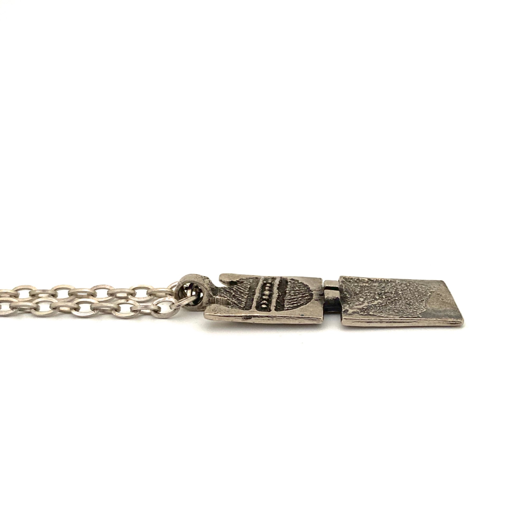 profile Robert Larin Canada vintage brutalist pewter textured pendant necklace Canadian Modernist jewelry design